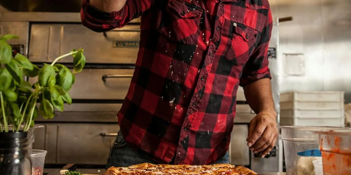 Pizza preparation at Good Pie