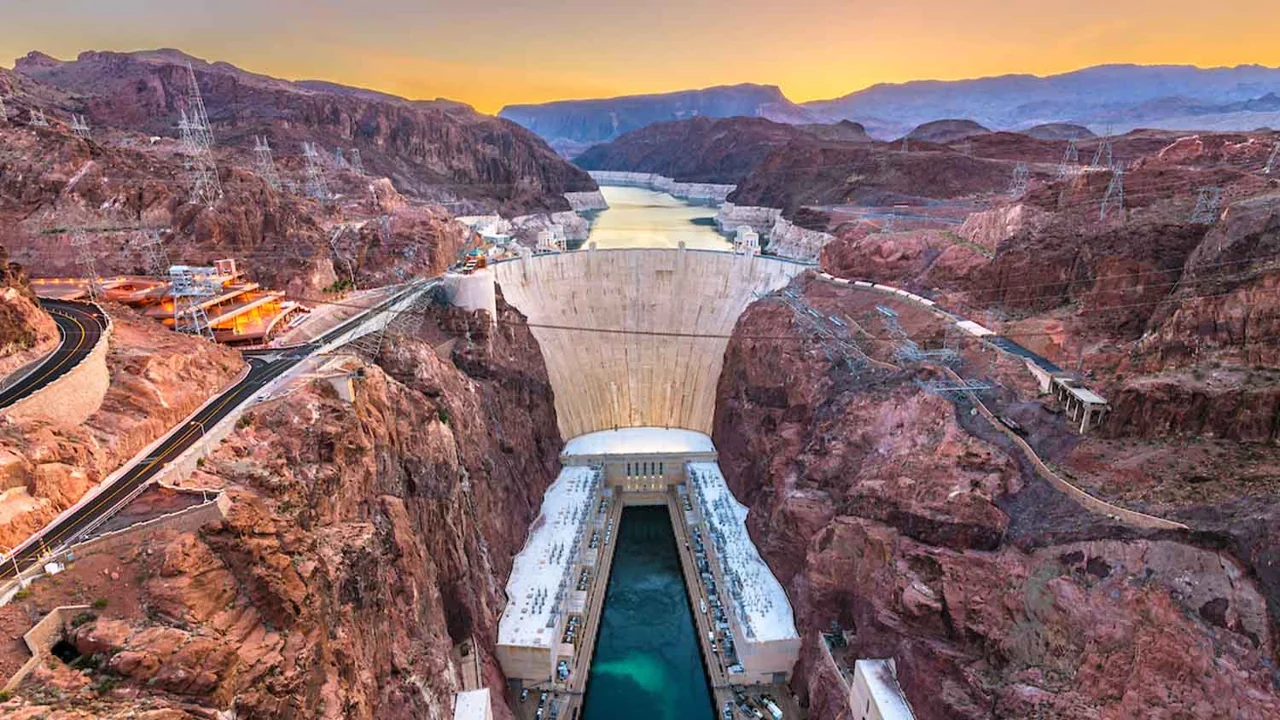 Hoover Dam and the Colorado River canyon at sunset